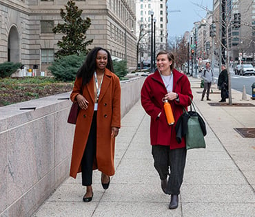 Students walking down a sidewalk in Washington, DC